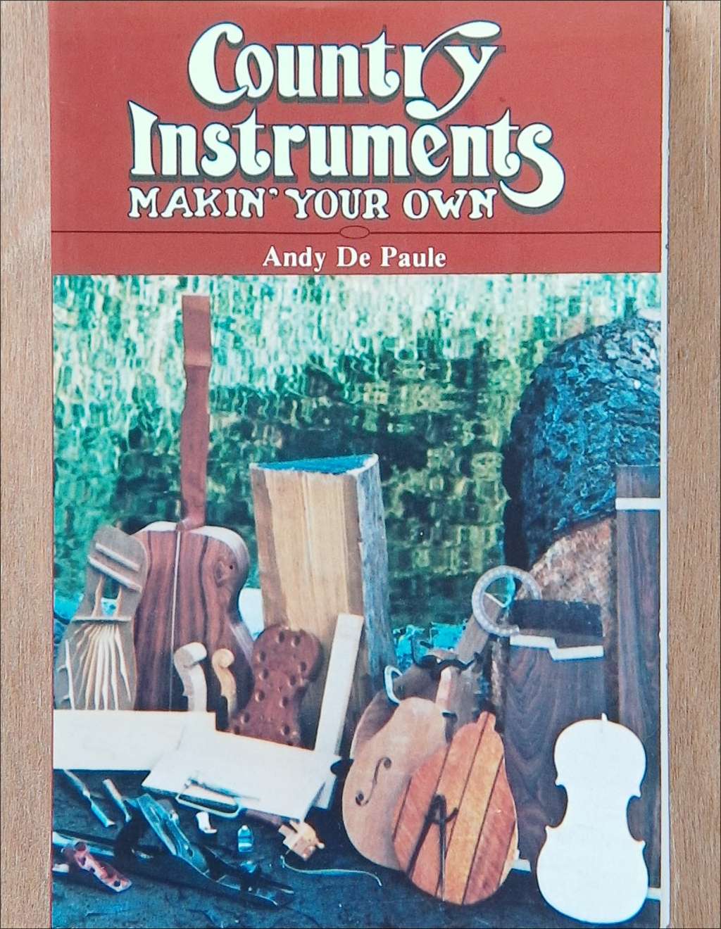 An image of a woodworking book cover: Country Instruments Makin' Your Own by Andy De Paule