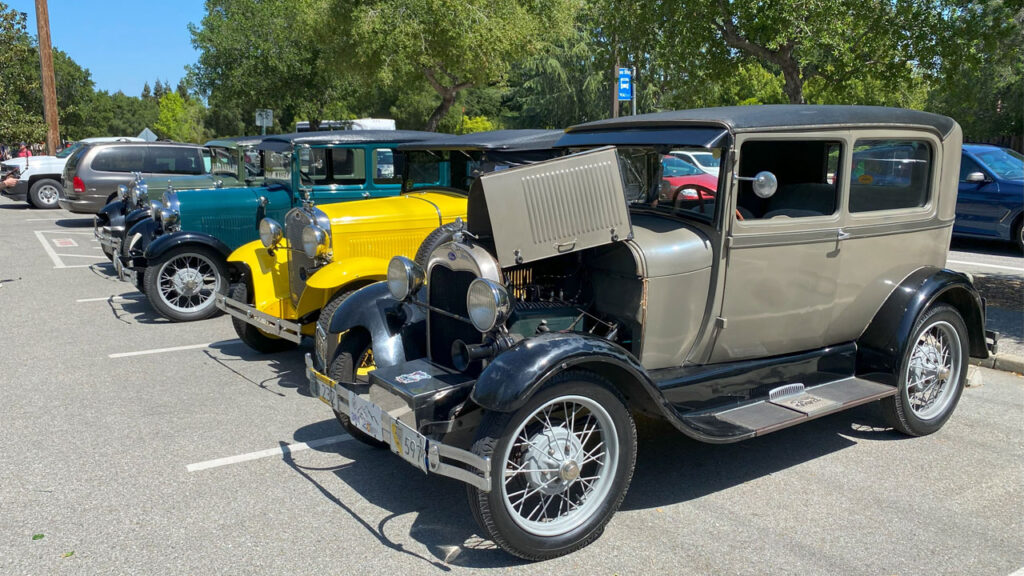 Four vintage cars at Saratoga Blossom Festival