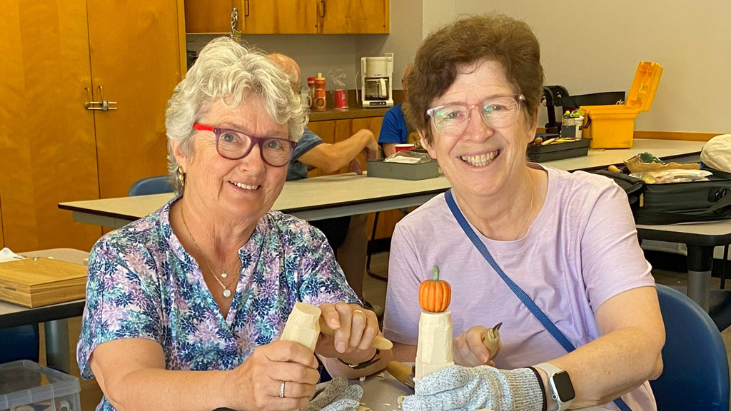Birdie and Ursula started whittling pumpkins.