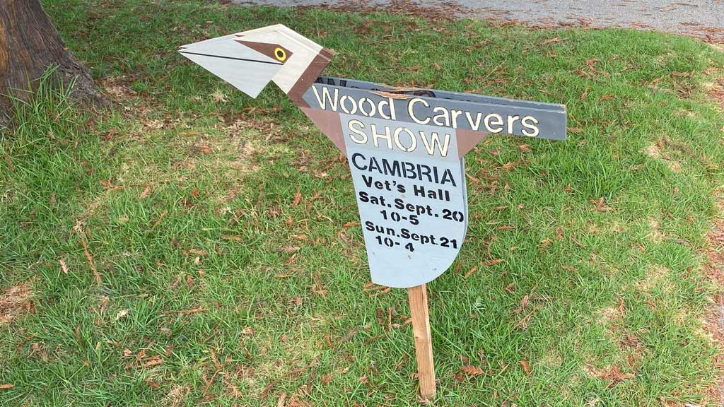 A simple wooden sign at the Central Coast Woodcarvers show in Cambria, CA.