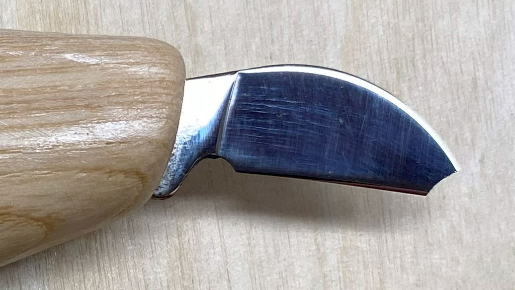 A chip carving knife with a broken tip.