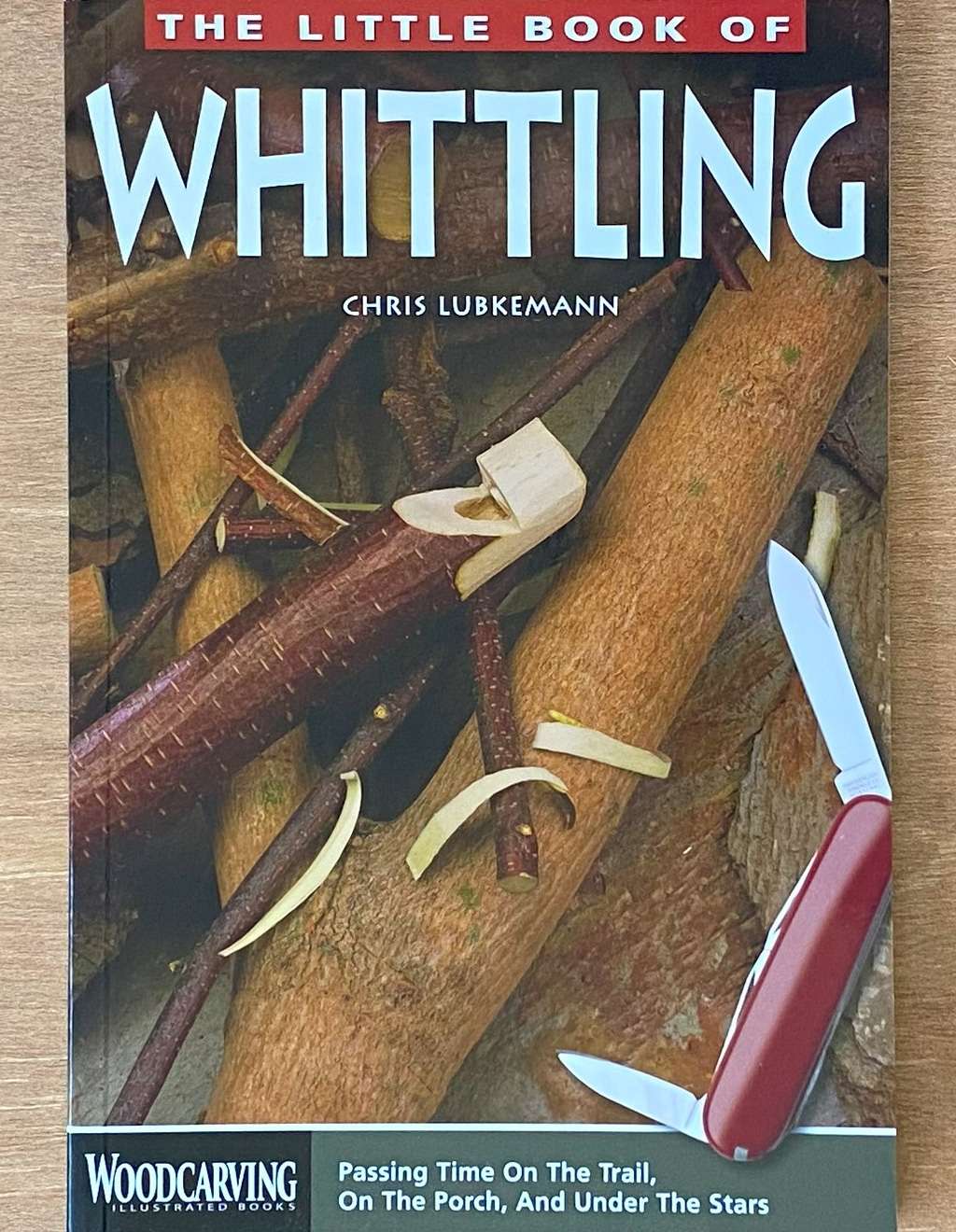 An image of a woodcarving book cover: The Little Book of Whittling by Chris Lubkemann