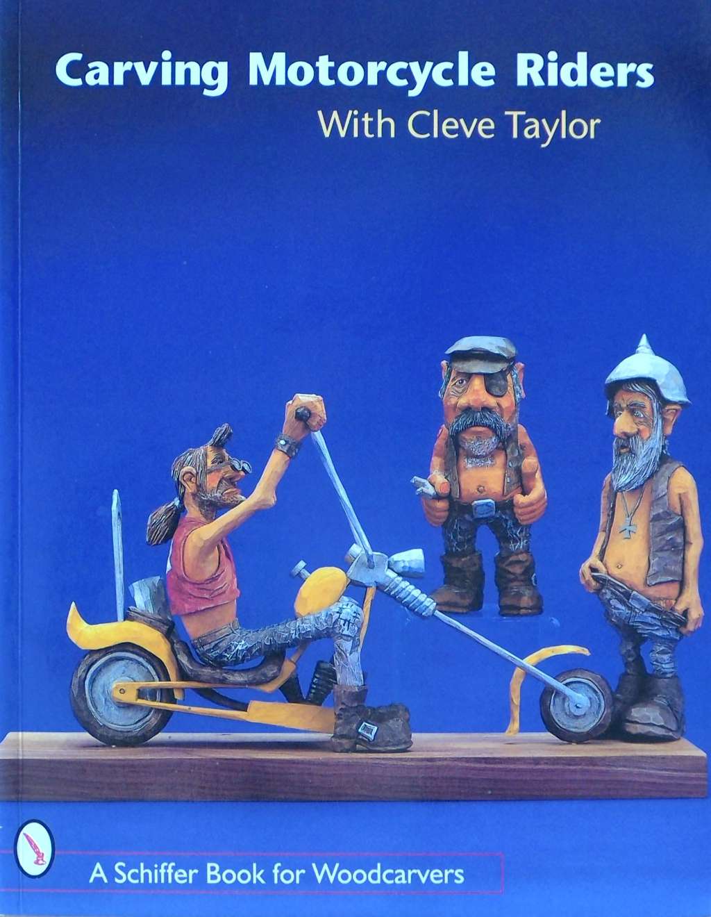 An image of a woodcarving book cover: Carving Motorcycle Riders by Cleve Taylor