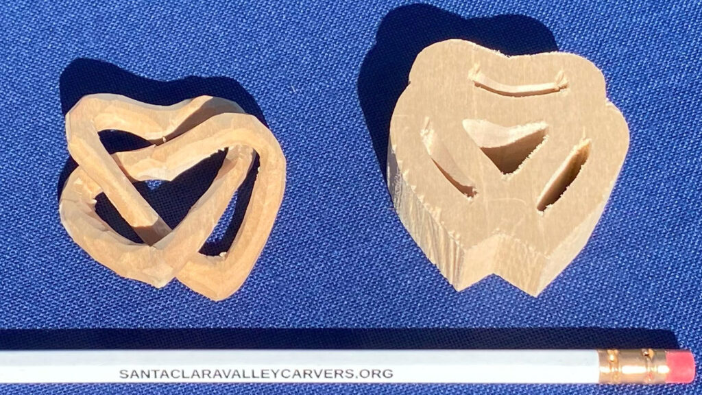 The Heart-Mobius whittling project by Darryl Easter. The photo also includes an uncarved blank for reference.