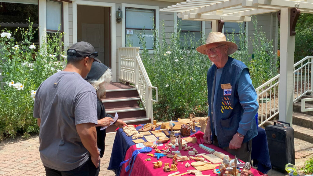 David Osterlund answers questions from festival-goers at the Blossom Festival in Saratoga, 2025