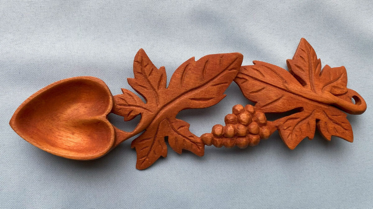 A delicate spoon carved and stained by David Osterlund. David won the Best of Show award at the Tri-Valley Carvers show in 2025 for this grape leaf spoon.