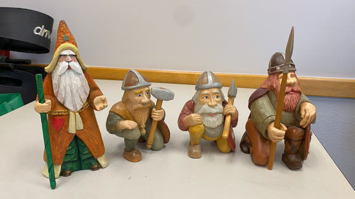 A Santa and three Viking warriors, carved and painted by David Osterlund. The photo was taken for the SCVC woodcarving newsletter.