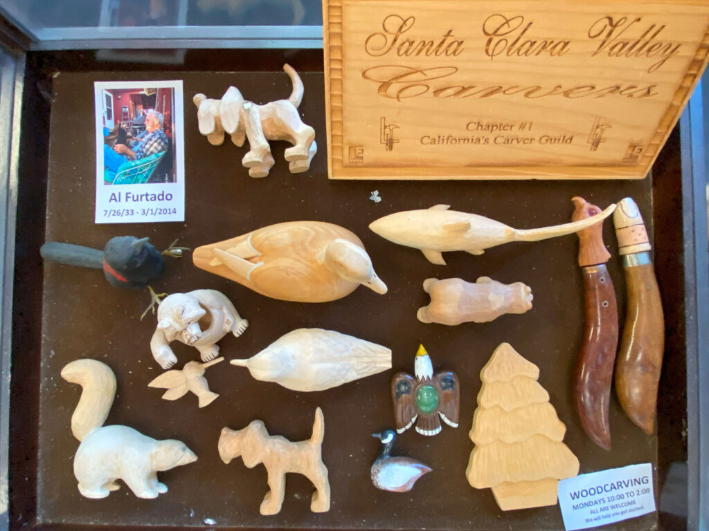 In memory of Al Furtado (7/26/1933-3/1/2014) we present a display case full of Al's wood carvings. Al liked carving animals.