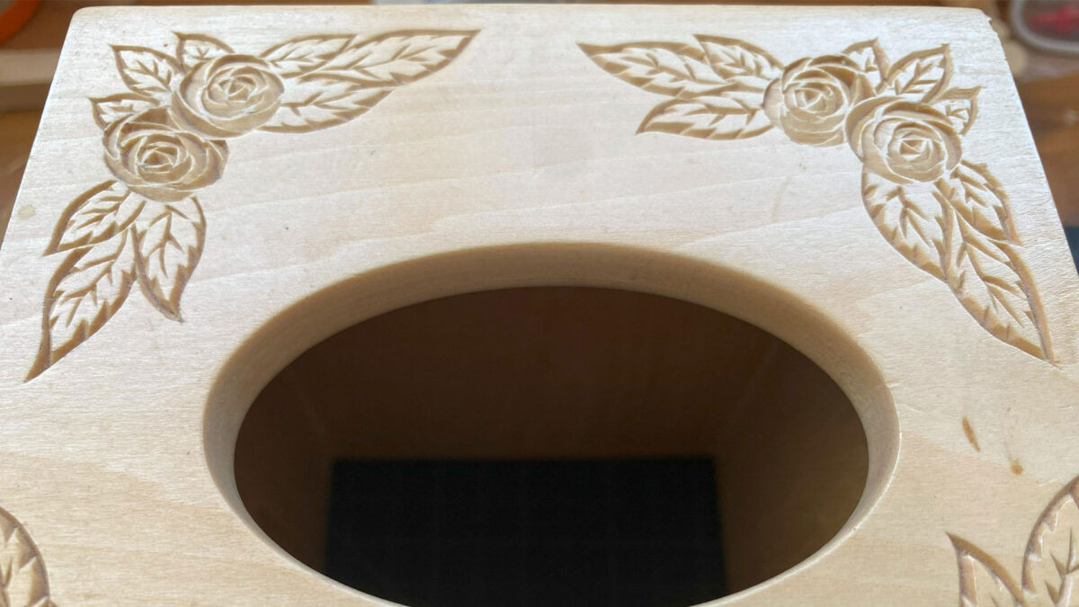 Chip carved roses with leaves by Ed Heskett, 2025.