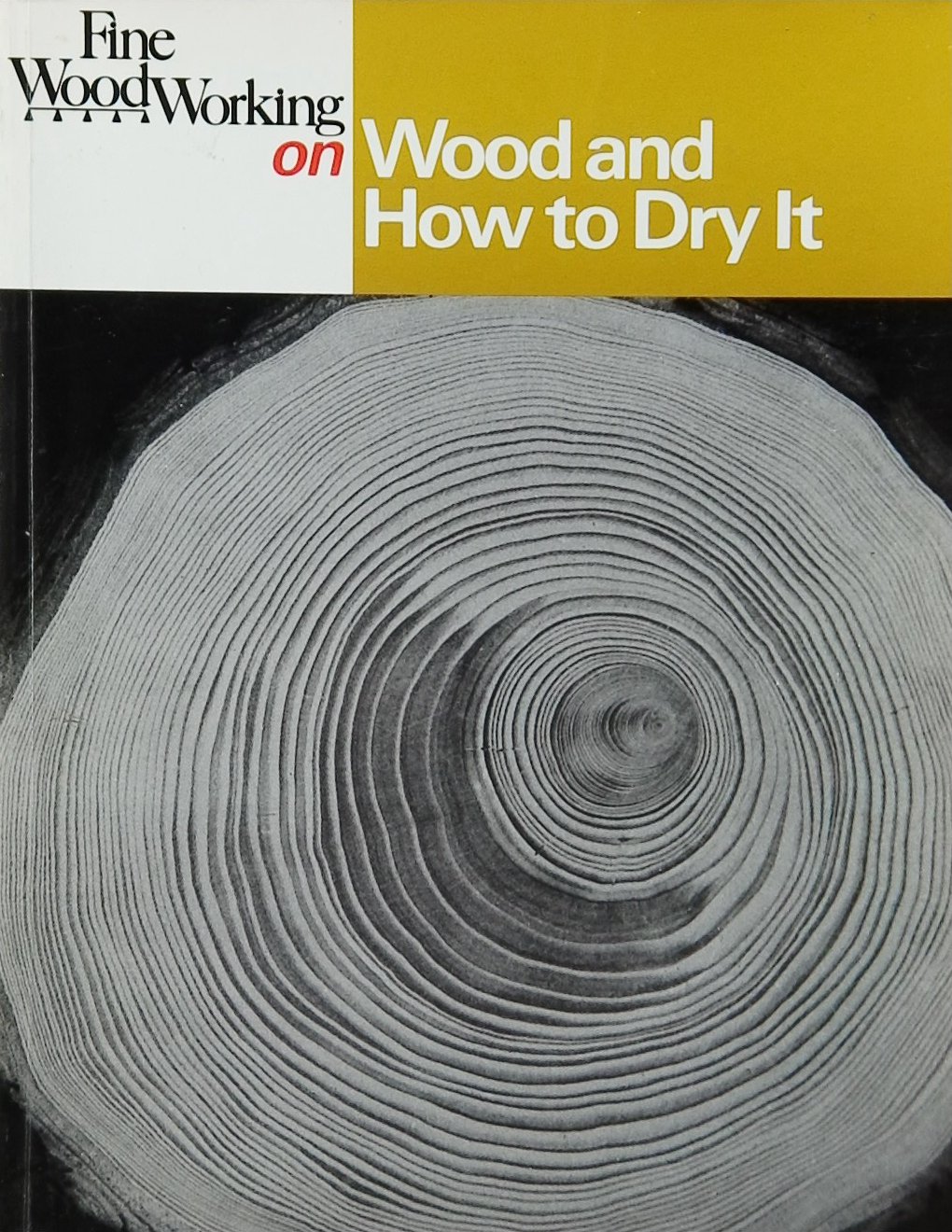 An image of a woodworking book cover: Wood and How to Dry It by Fine WoodWorking; 1986, 105p