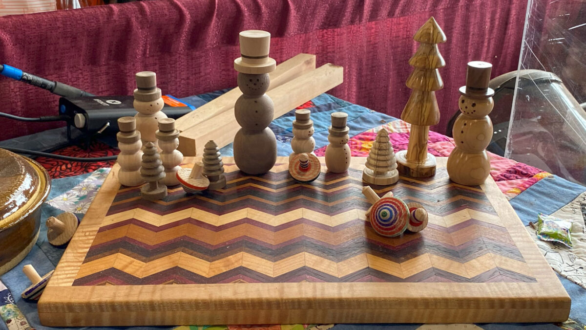 A dozen woodturning projects: snowmen, wooden trees, and spinning tops.