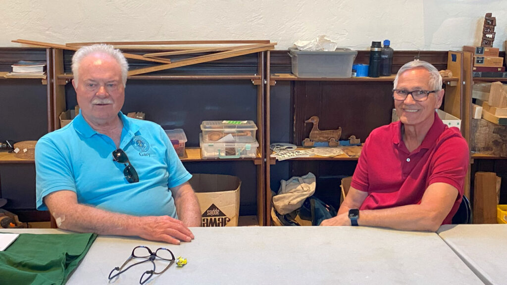 Gary and Tim run the country store at the TVC woodcarving show in September 2025.