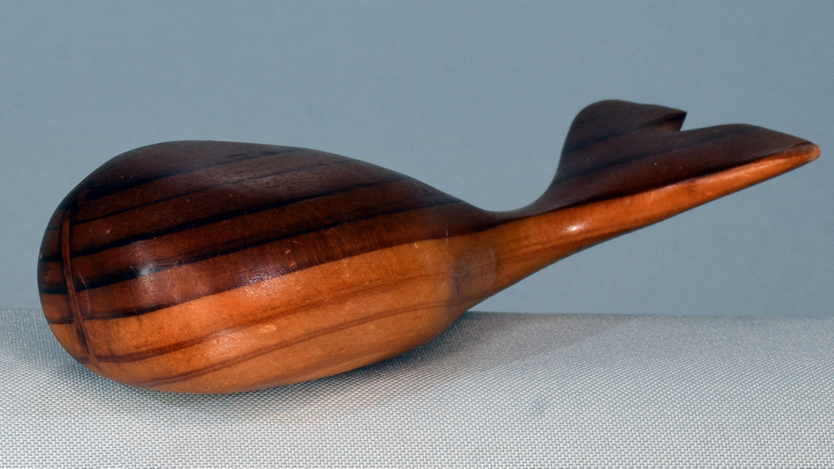 A stylized whale carved from a piece of redwood many years ago. This carving may look simple, but it is special; it is the first project Jim Phipps, our club member, has ever carved. The carving is about 6” long.