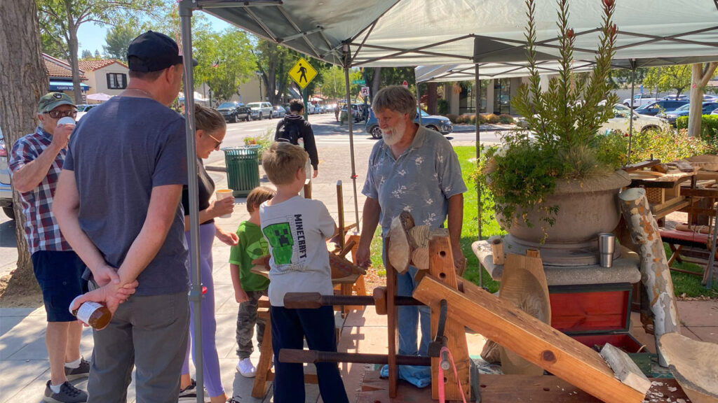 Jim Planting greets TVC woodcarving show visitors in Pleasanton, CA. September 2025.