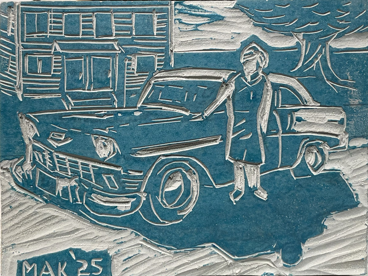 A carved linoleum block for printing.
