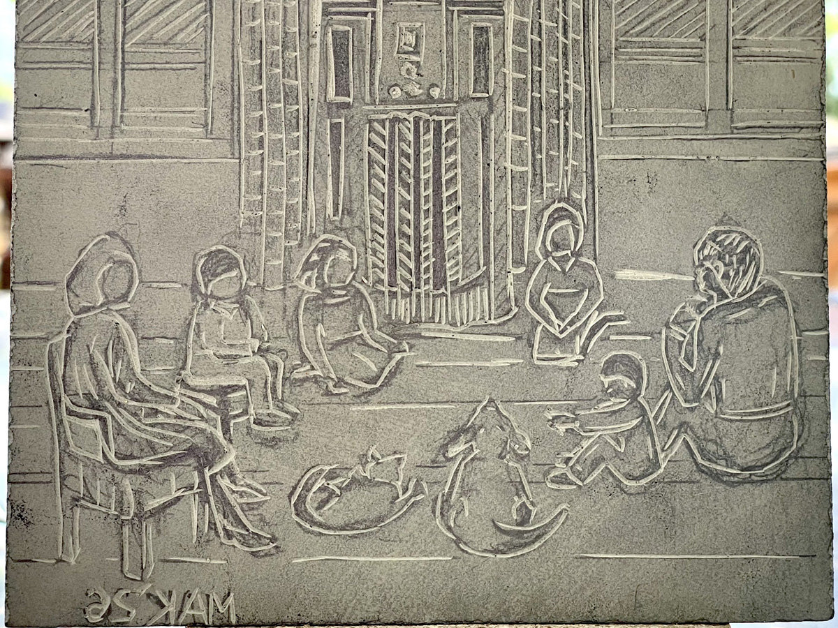 A partially carved linoleum block by Jordan Makower titled "Family Radio Time." The image depicts a memory-based scene of a family gathering indoors. Several figures, including adults and children, are seated in a relaxed semicircle on the floor and in chairs within a room.