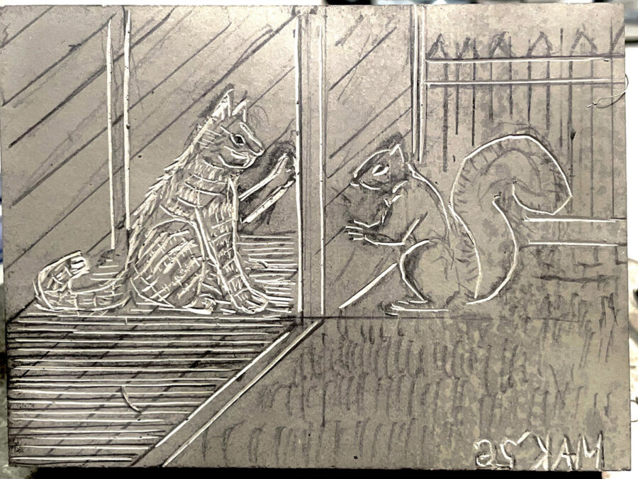 A linoleum block carving in the outline stage, titled "Lunch," showing a cat on the left reaching through vertical slats at a squirrel on the right that is holding food. The piece features thin white incised lines against a grey background and includes horizontal planks beneath the cat and a fence with triangular tops in the upper right. Signed by Jordan Makower in the bottom corner.
