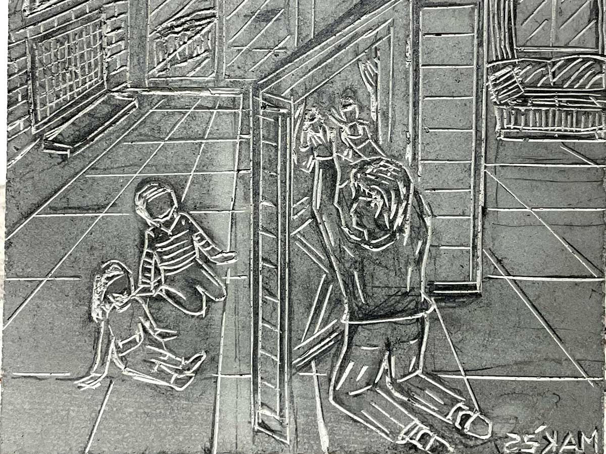 Outlining the design on the linoleum block for printing.