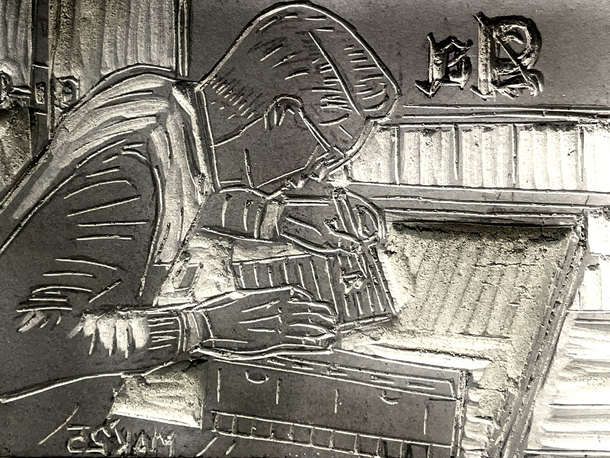 Carved linoleum block; ready to be printed.