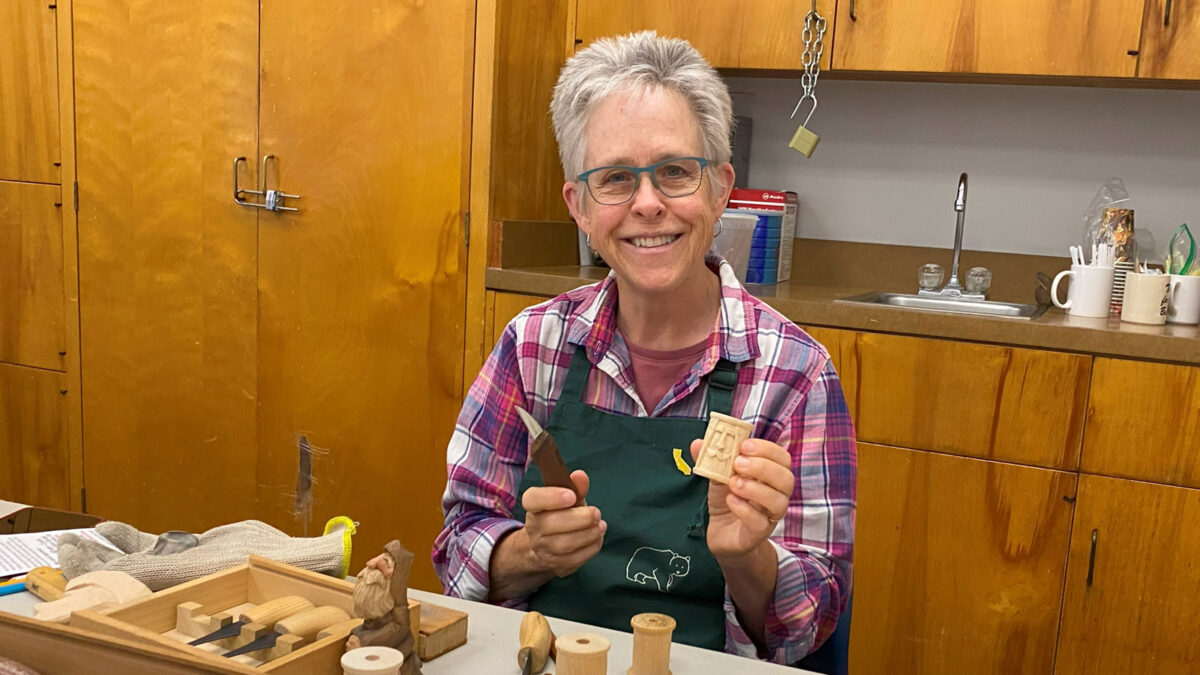 Lindy carved a wooden spool