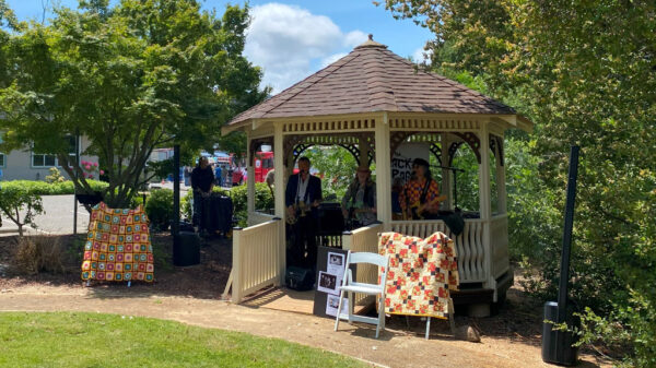 Musicians played music and sang in the gazebo at the Saratoga Blossom Festival.