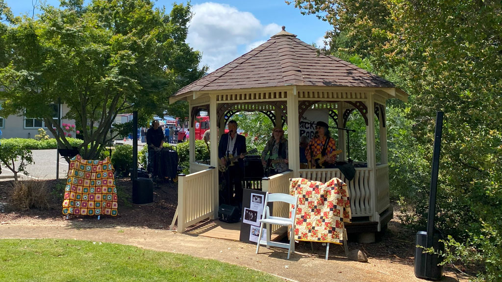Musicians played music and sang in the gazebo at the Saratoga Blossom Festival.