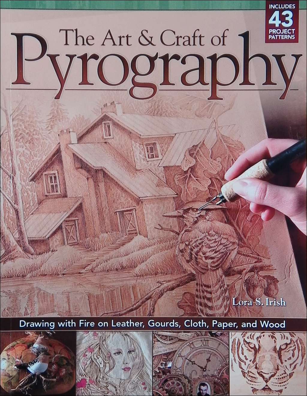 An image of a pyrography book cover: The Art & Craft of Pyrography by Lora S. Irish