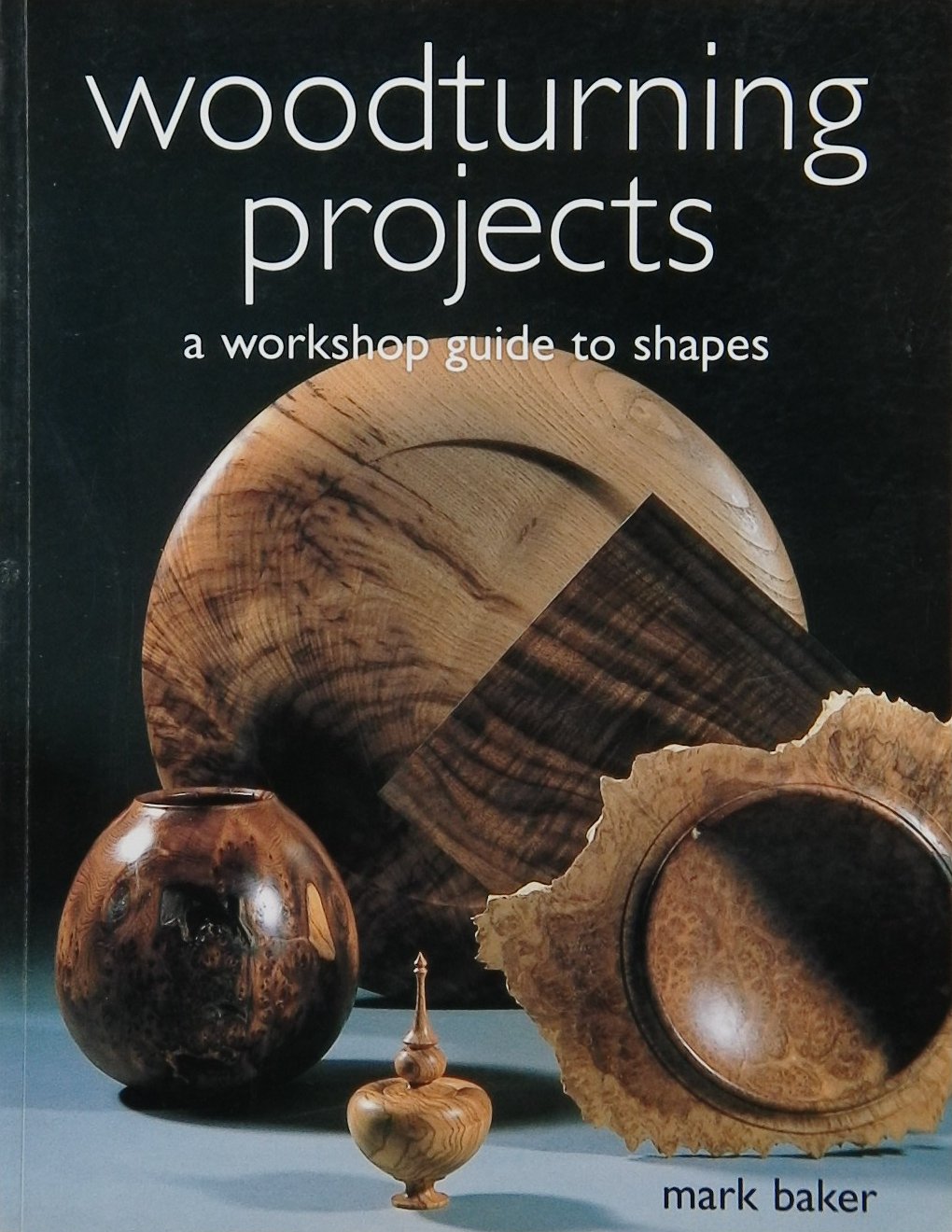 An image of a woodturning book cover: Woodturning Projects: A Workshop Guide to Shapes by Mark Baker; 2003, 191p