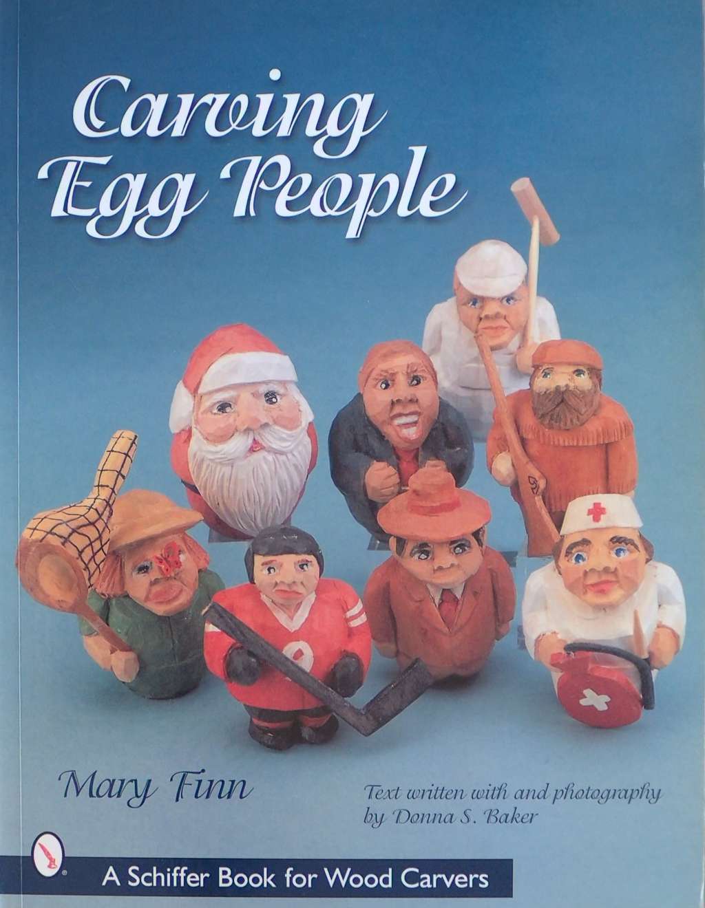 An image of a woodcarving book cover: Carving Egg People by Mary Finn
