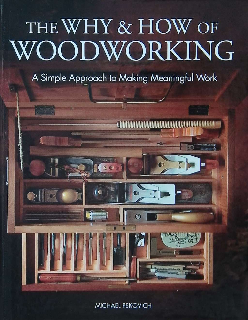 An image of a woodworking book cover: The Why & How of Woodworking by Michael Pekovich