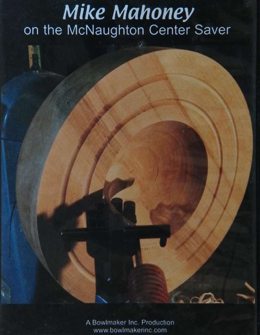 An image of a woodturning book cover: Mike Mahoney on the McNaughton Center Center Saver. DVD by Mike Mahoney