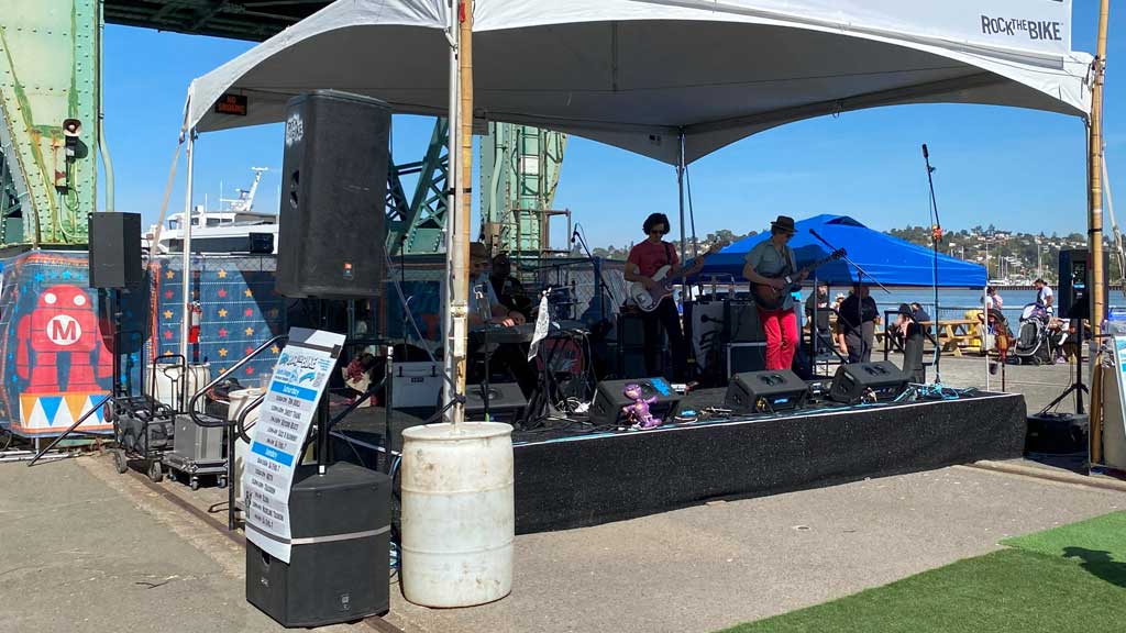 Music stage with performing musicians.
