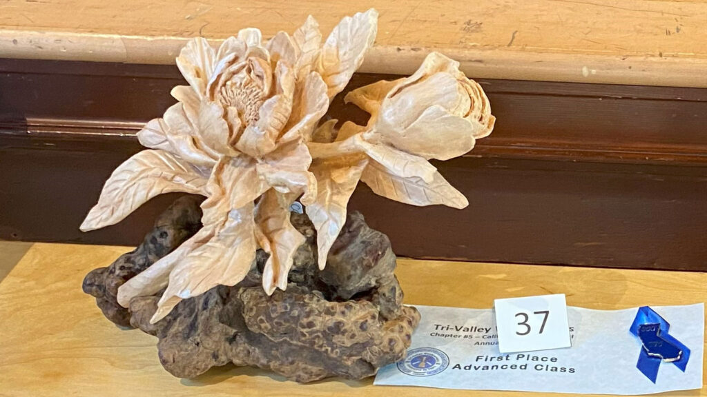 Peony flower woodcarving.