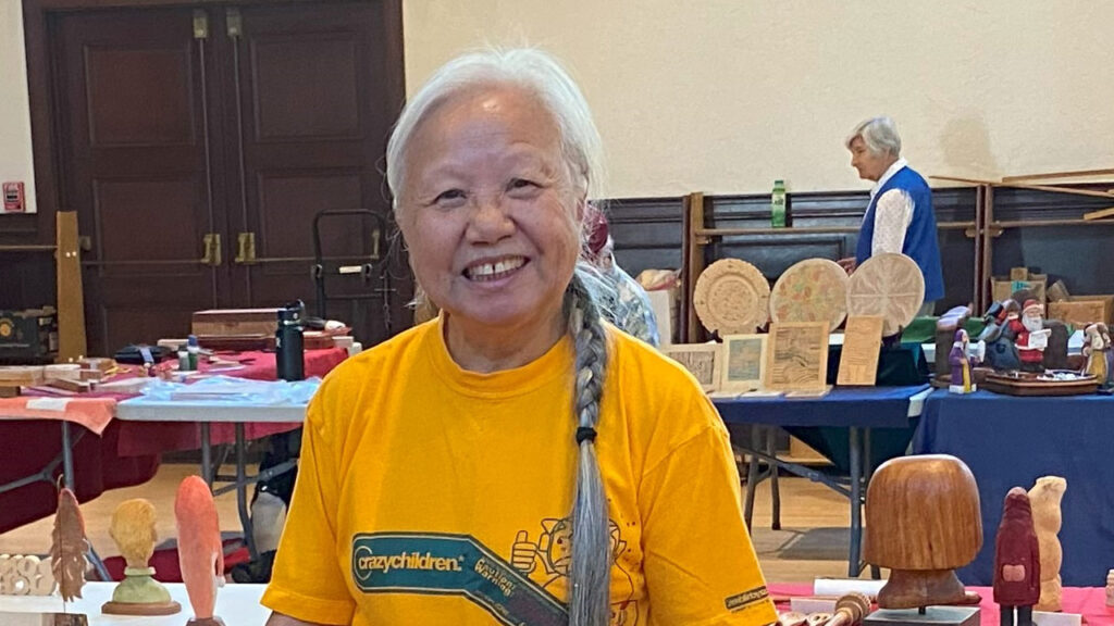 Ngum Worley won the People's Choice award for carving the Peony Flower.