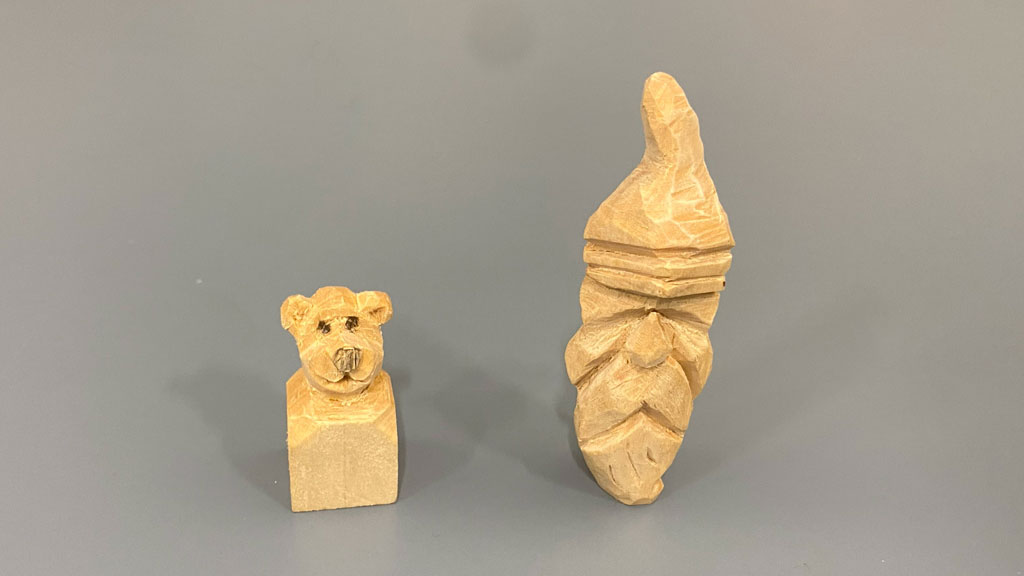 A cute miniature bear and the bearded face carved by Nitin Varshney.