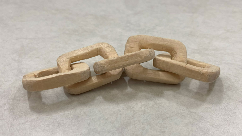 A five-link basswood chain carved by Nitin