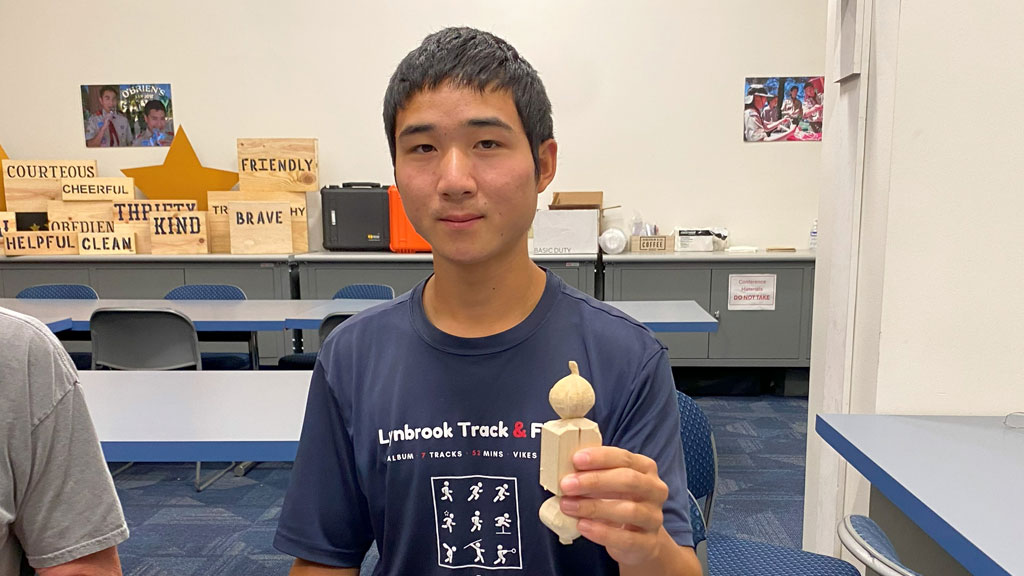 Patrick with partially completed carved pumpkins