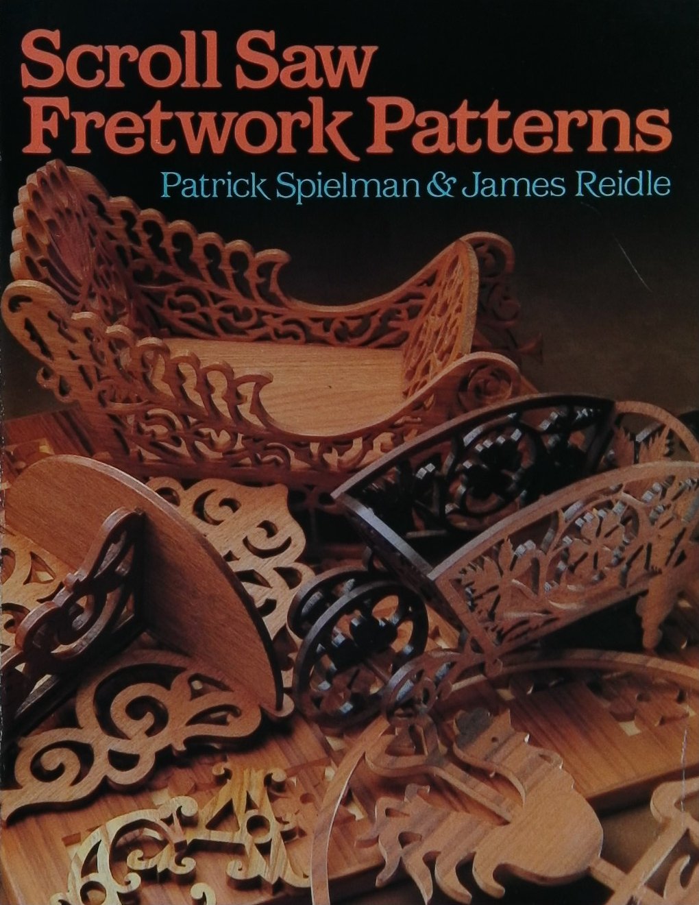 An image of a woodworking book cover: Scroll Saw Fretwork Patterns by Patrick Spielman, James Reidle; 1989, 249p
