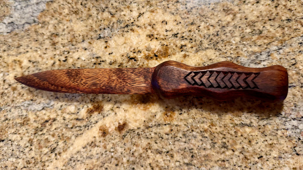 A letter opener carved from Koa wood by Pranay Agrawal. Finished with tung oil. Added some chip carvings on the handle sides.