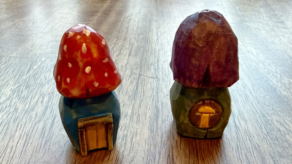 Colorful mushroom huts carved by Pranay Agrawal.
