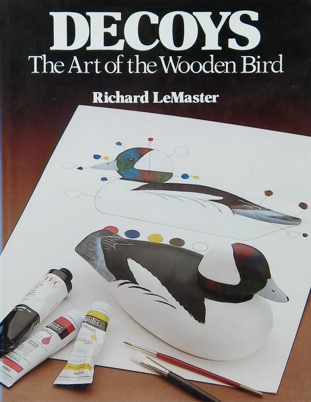 An image of a woodcarving book cover: Decoys: The Art of the Wooden Bird by Richard LeMaster; 1982, 156p