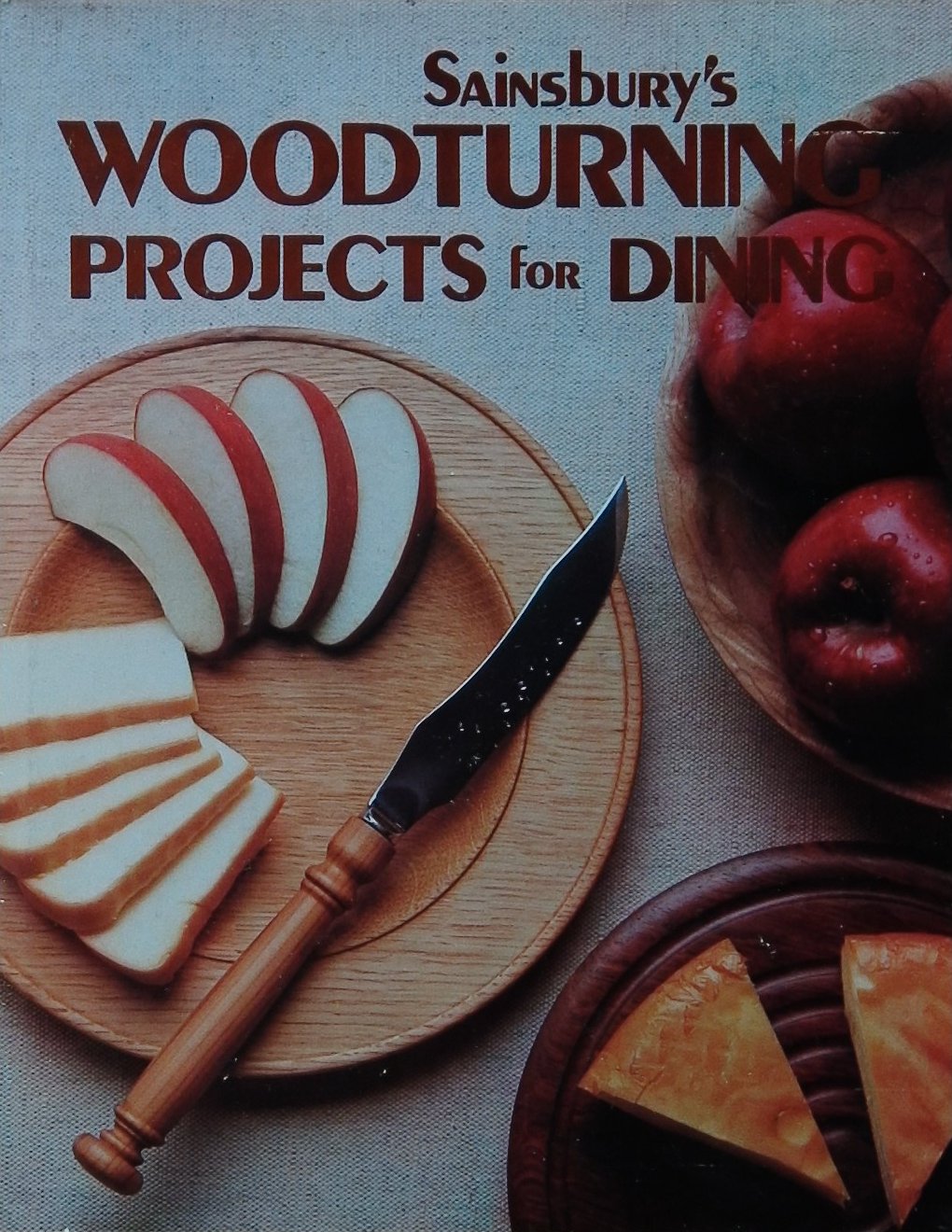 An image of a woodturning book cover: Sainsbury's Woodturning Projects for Dining by Sainsbury's
