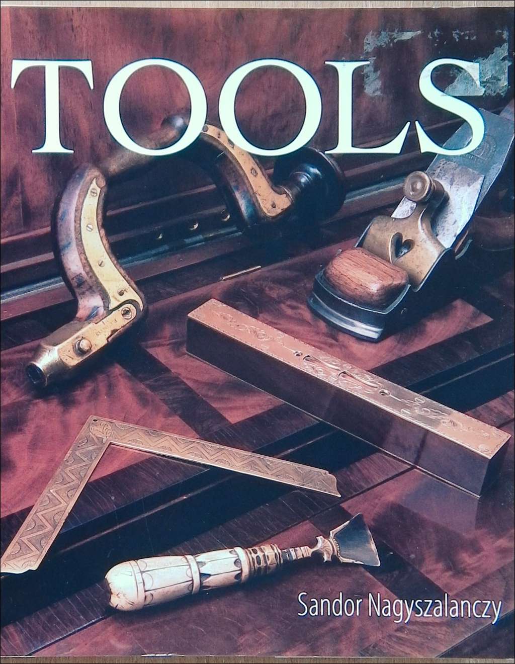 An image of a woodworking book cover: The Art of Fine Tools by Sandor Nagyszalanczy