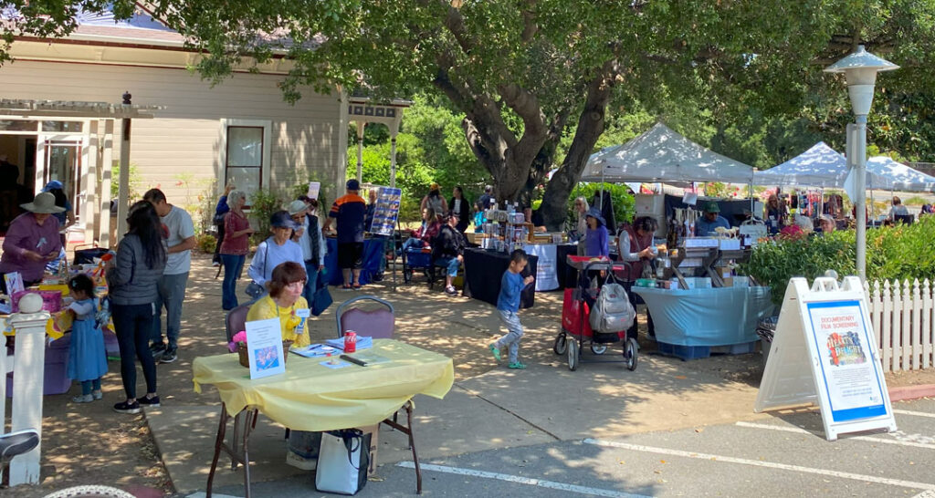 Many crafts and arts booths at the Saratoga Blossom Festival, 2025.