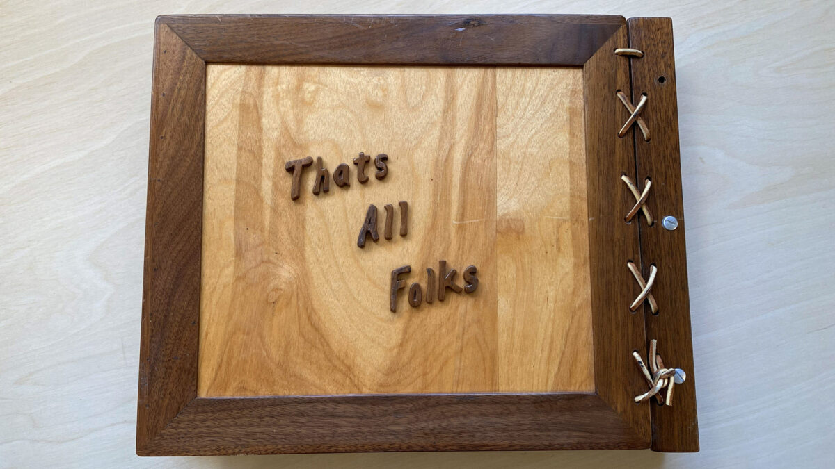 Hand-carved album cover, back side. Size: 15 1/4 x 12 1/4". Height: 1 1/2".