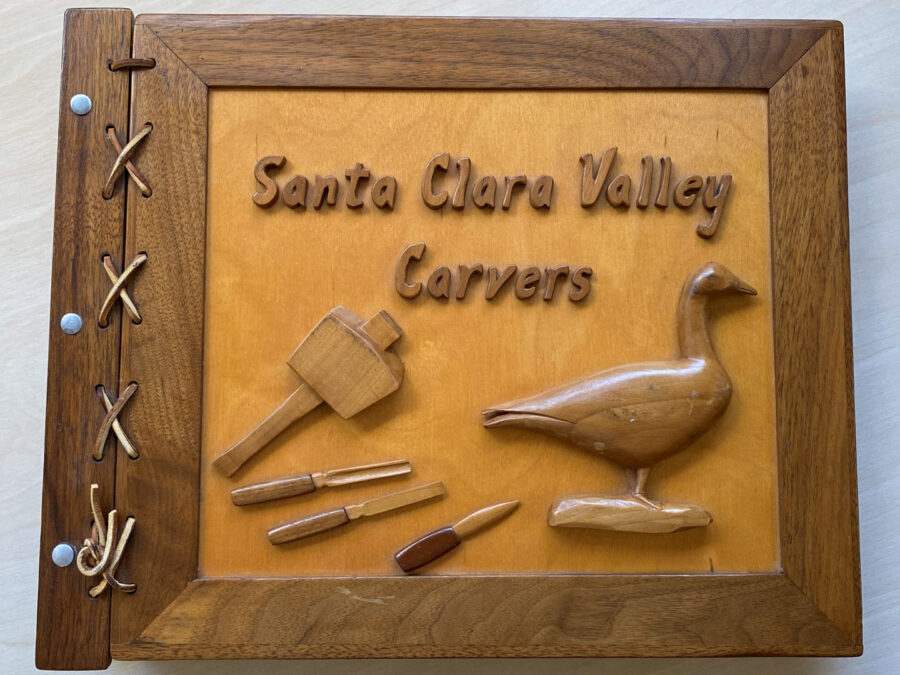 Hand-carved album cover. Size: 15 1/4 x 12 1/4". Height: 1 1/2".