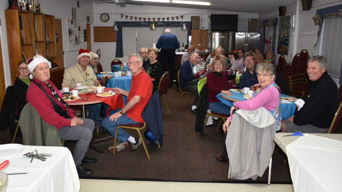 About 20 woodcarvers celebrate the winter holidays.