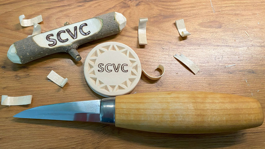 Whittled and chip-carved name tags and a woodcarving knife for Santa Clara Valley Carvers carving workshops and whittling demonstrations.