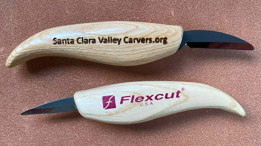 Two Flexcut knives in the SCVC tool library. The knives are branded with the "SantaClaraValleyCarvers.org" label. The photo was taken for the SCVC woodcarving newsletter.
