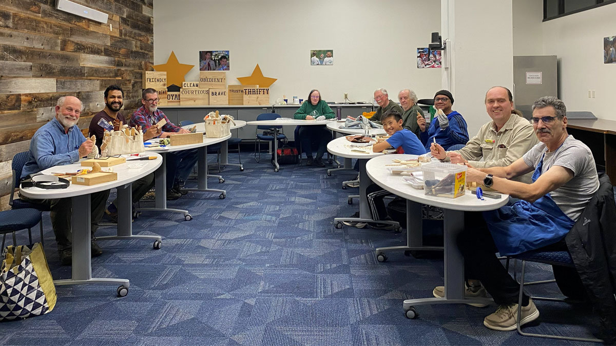 A dozen woodcarvers at the weekly carving meetup in San Jose. The photo was taken for the December woodcarving newsletter.